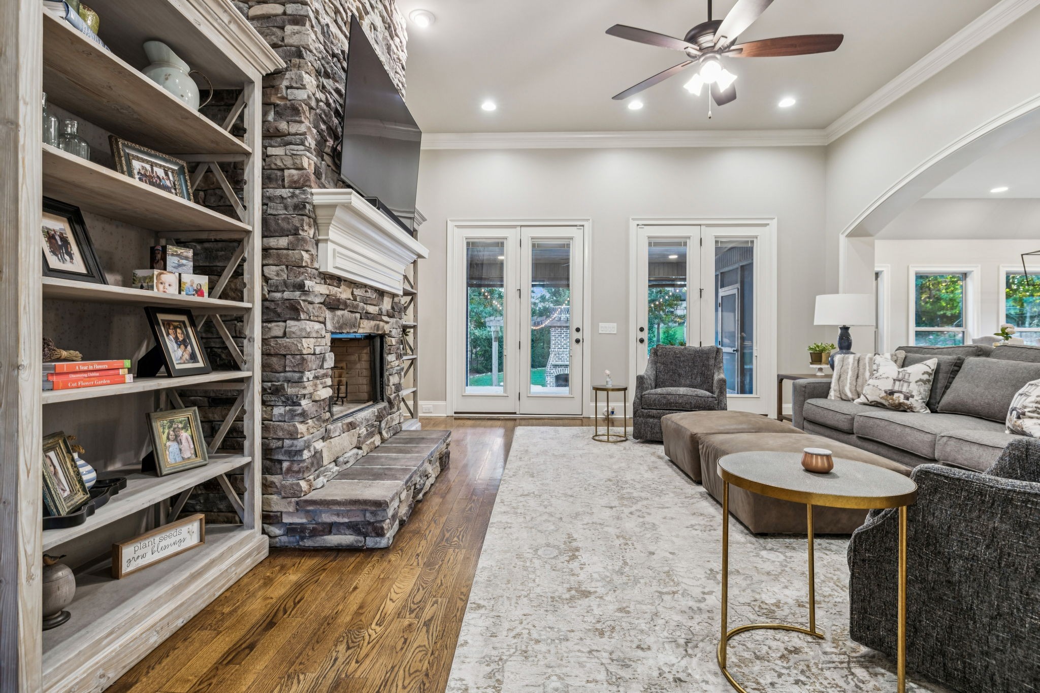 240 Laycrest Drive Mount Juliet, TN 37122 - Photo 22 of 100 a living room with furniture and a book shelf