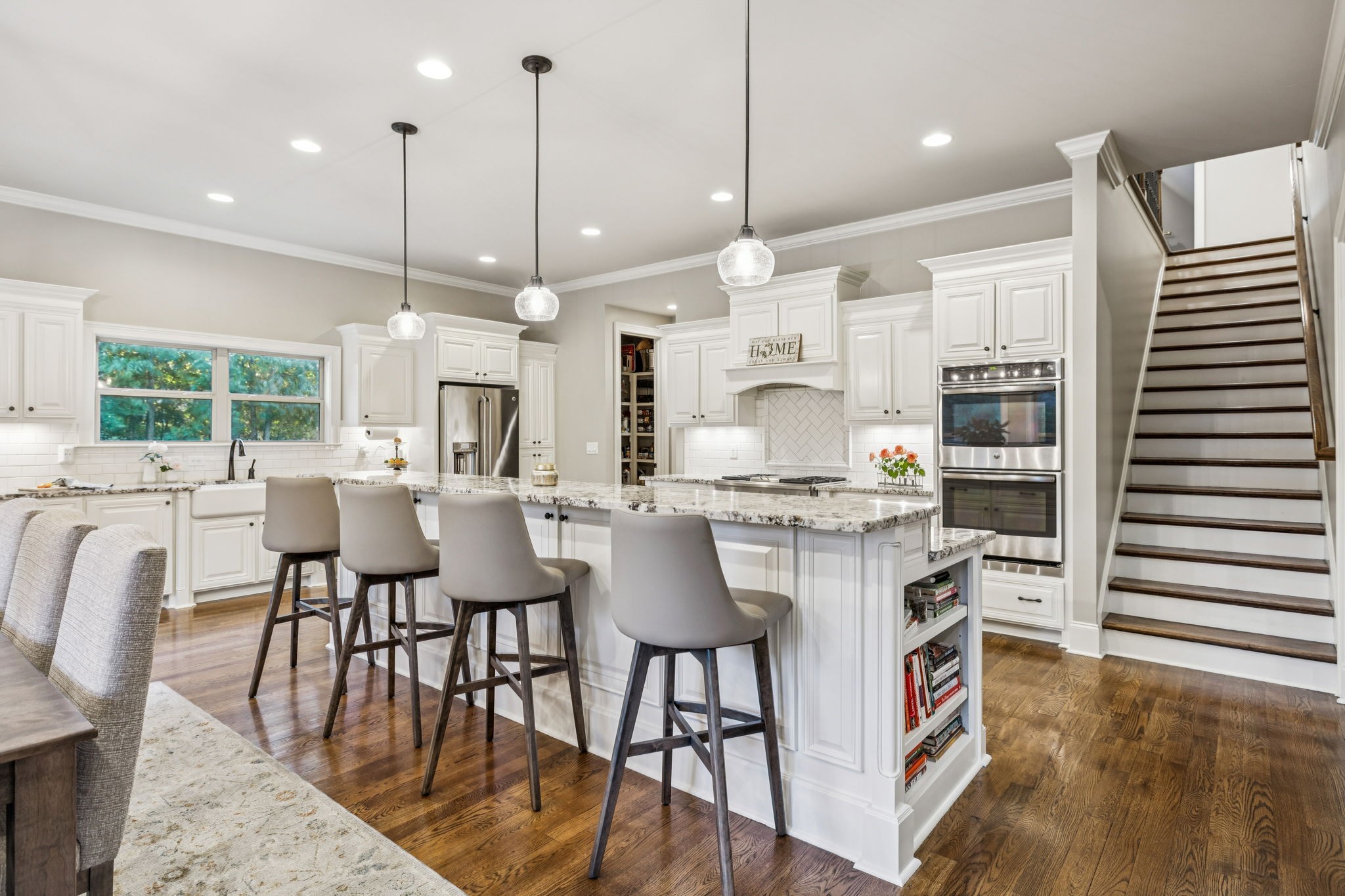 240 Laycrest Drive Mount Juliet, TN 37122 - Photo 29 of 100 a large kitchen with a table and chairs