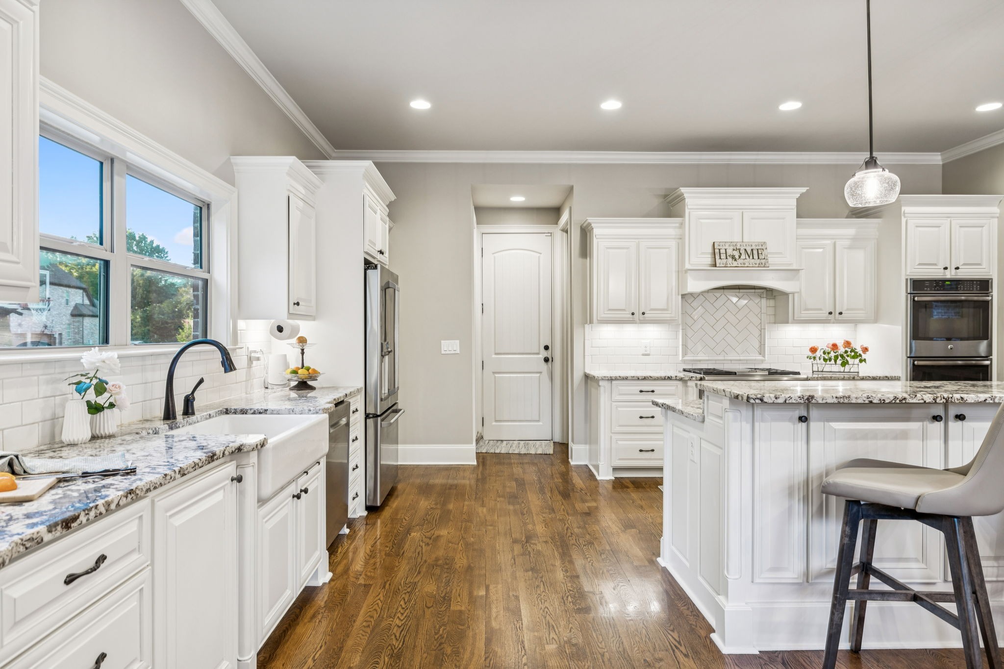 240 Laycrest Drive Mount Juliet, TN 37122 - Photo 35 of 100 a large kitchen with granite countertop lots of counter space dining table and stainless steel appliances