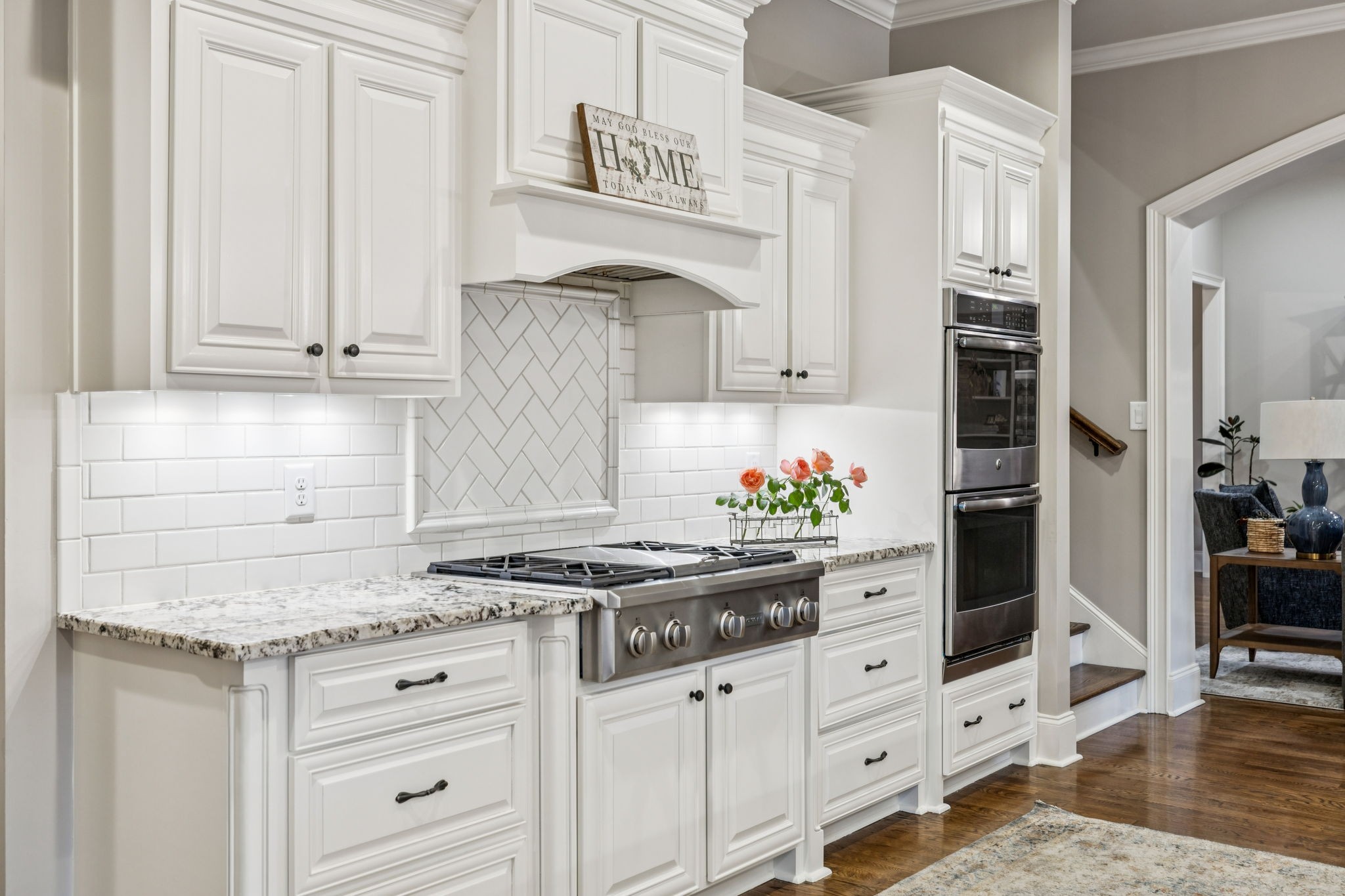 240 Laycrest Drive Mount Juliet, TN 37122 - Photo 37 of 100 a kitchen with stainless steel appliances granite countertop a stove a refrigerator and a white cabinets