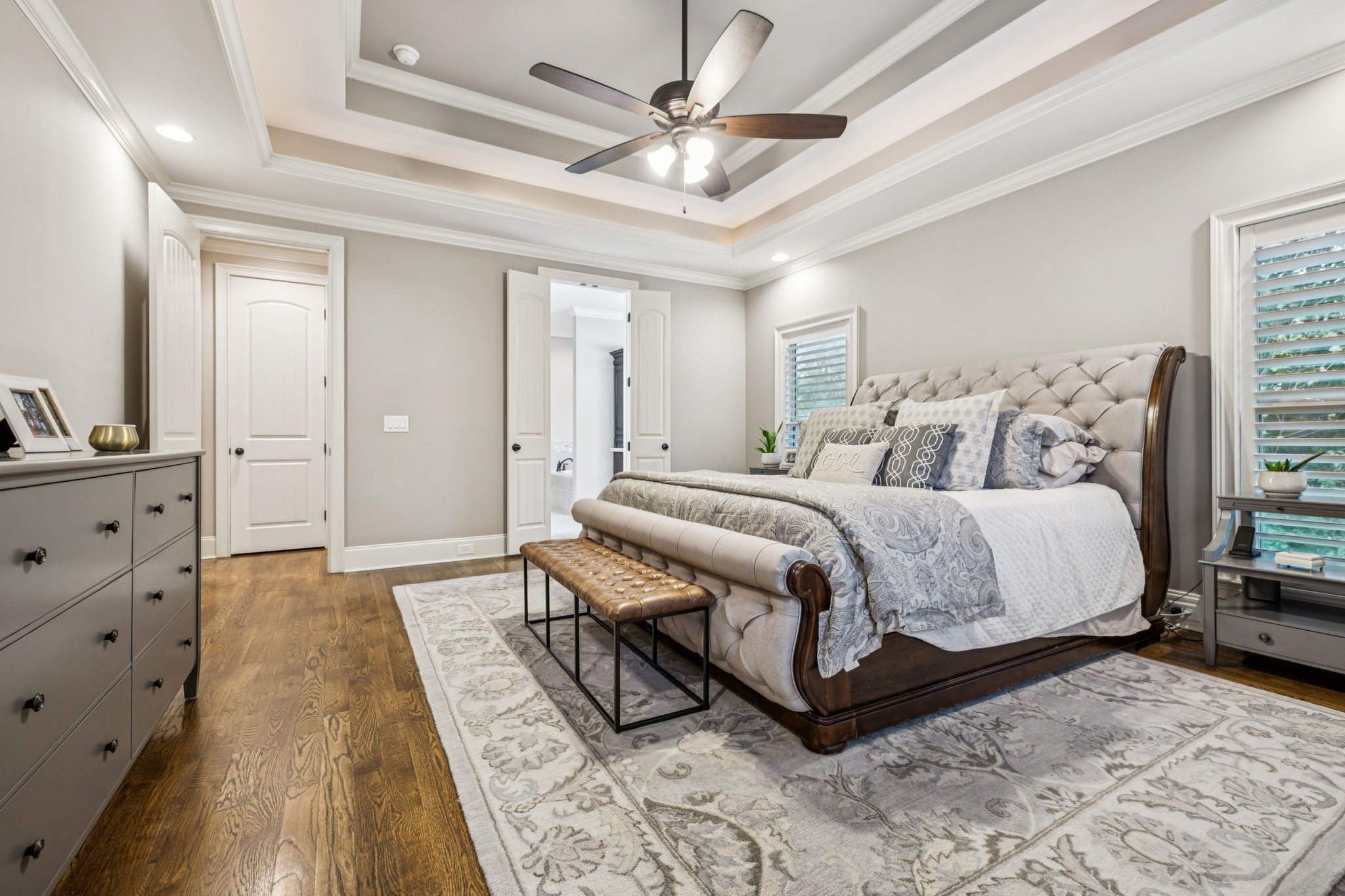 240 Laycrest Drive Mount Juliet, TN 37122 - Photo 4 of 100 a spacious bedroom with a bed a dresser and chandelier