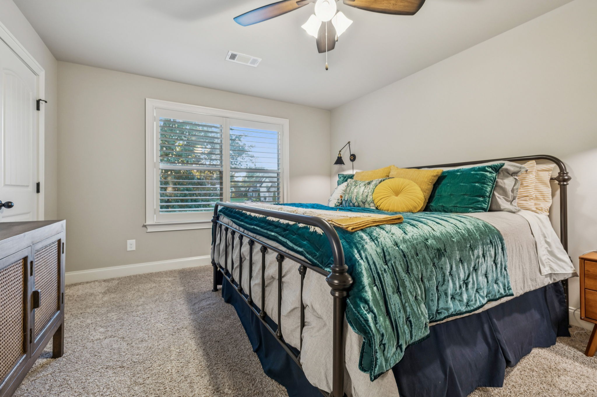 240 Laycrest Drive Mount Juliet, TN 37122 - Photo 54 of 100 a bedroom with a bed and a chandelier