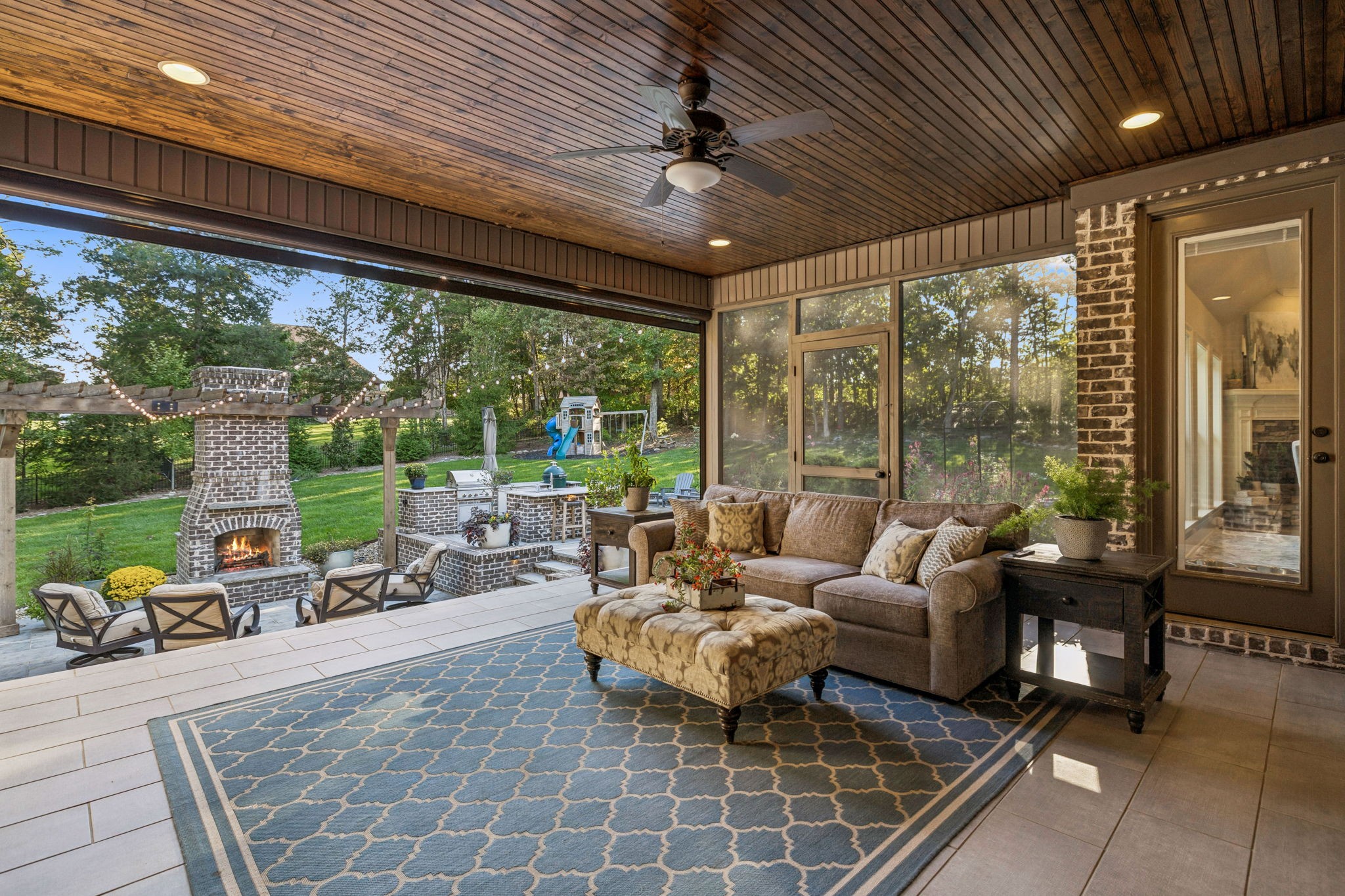240 Laycrest Drive Mount Juliet, TN 37122 - Photo 61 of 100 a living room with patio furniture and garden view