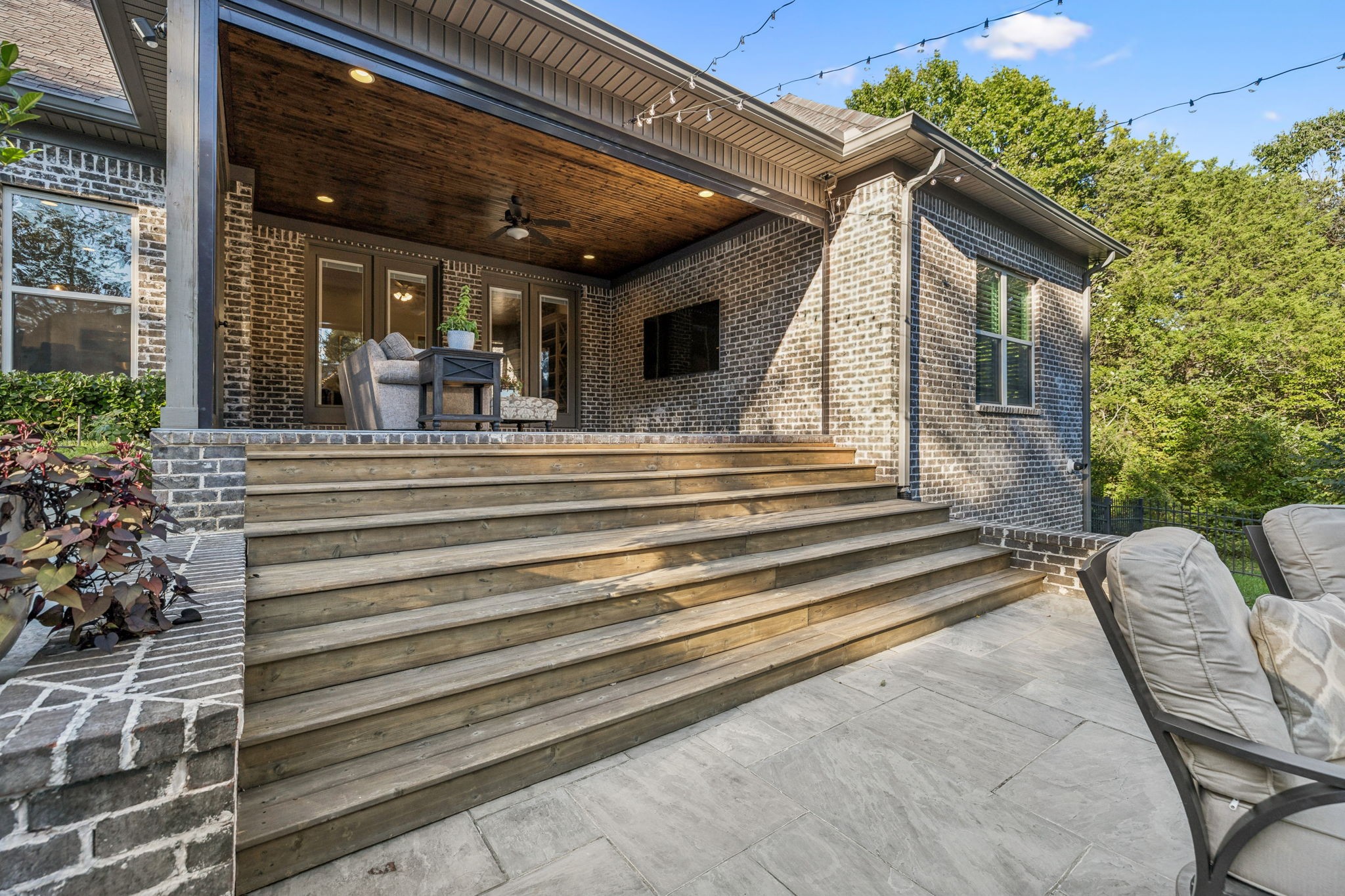 240 Laycrest Drive Mount Juliet, TN 37122 - Photo 70 of 100 a view of a patio with a chairs and table in the balcony