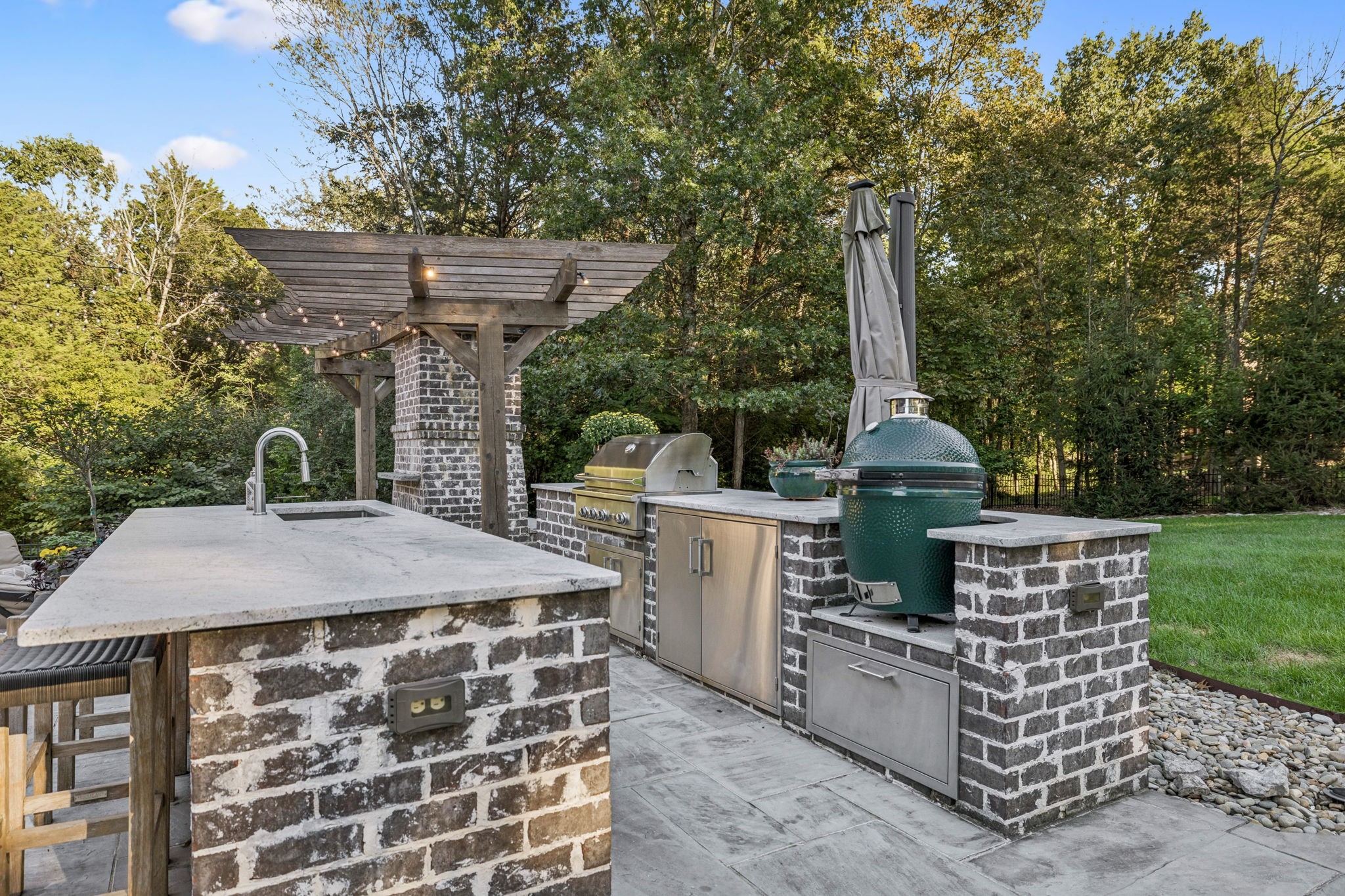 240 Laycrest Drive Mount Juliet, TN 37122 - Photo 76 of 100 a view of a patio with table and chairs a barbeque with wooden fence
