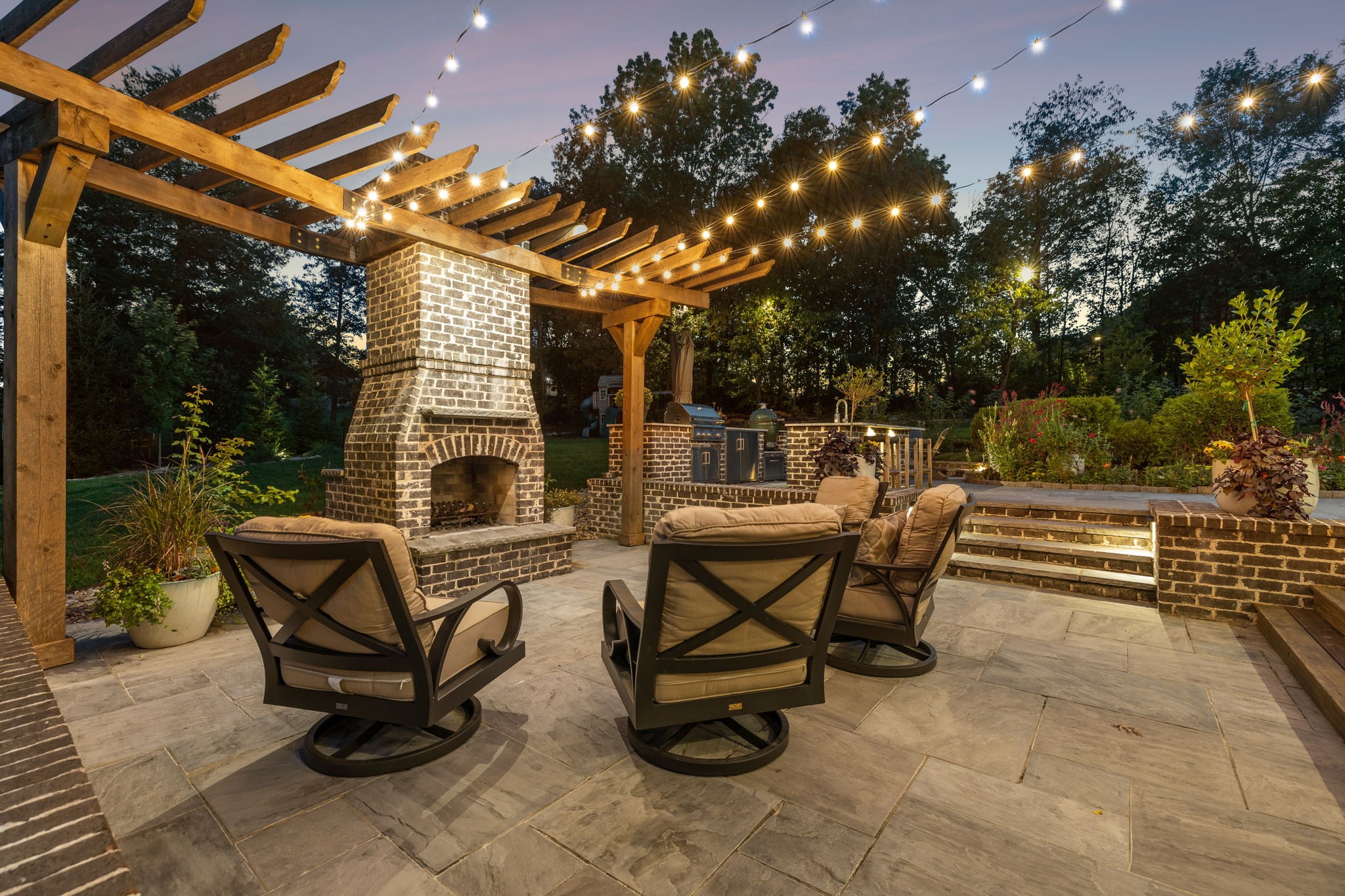 240 Laycrest Drive Mount Juliet, TN 37122 - Photo 94 of 100 a view of a patio with a table and chairs and potted plants