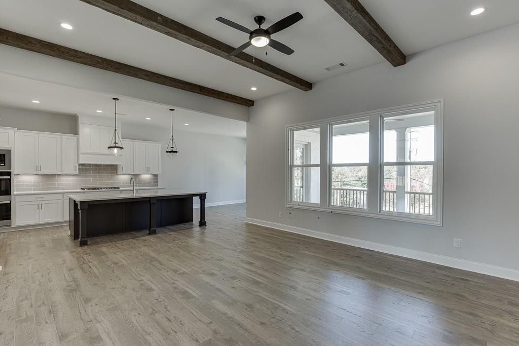446 Thunder Road Buford, GA 30518 - Photo 21 of 79 a view of kitchen with sink and window
