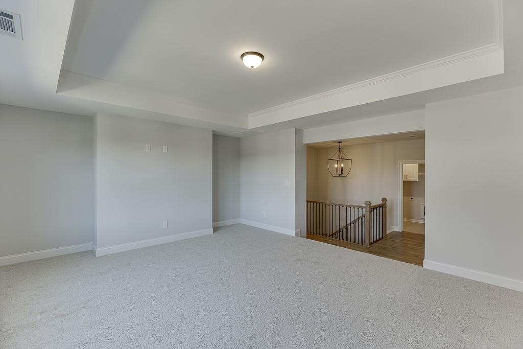 446 Thunder Road Buford, GA 30518 - Photo 29 of 79 a view of an empty room and a window