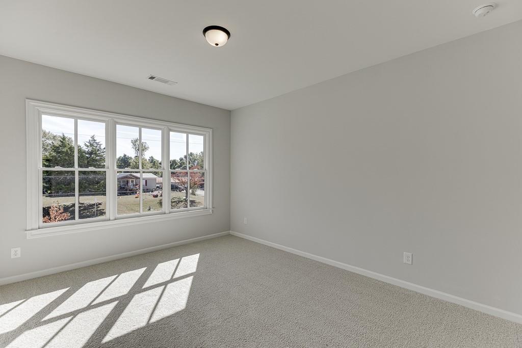 446 Thunder Road Buford, GA 30518 - Photo 31 of 79 an empty room with a window