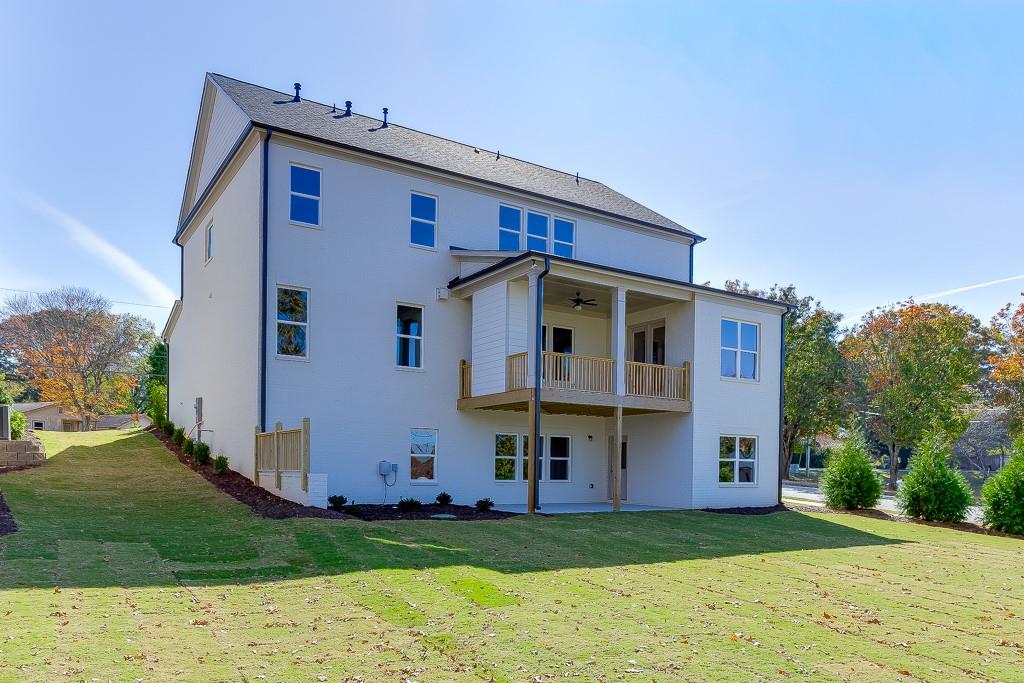 446 Thunder Road Buford, GA 30518 - Photo 50 of 79 a view of a house with a yard