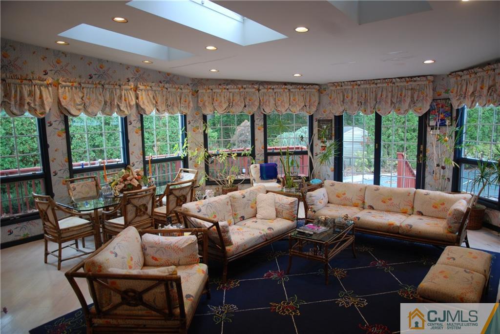 5 Moraine Road Edison, NJ 08820 - Photo 5 of 25 a living room with furniture and a large window