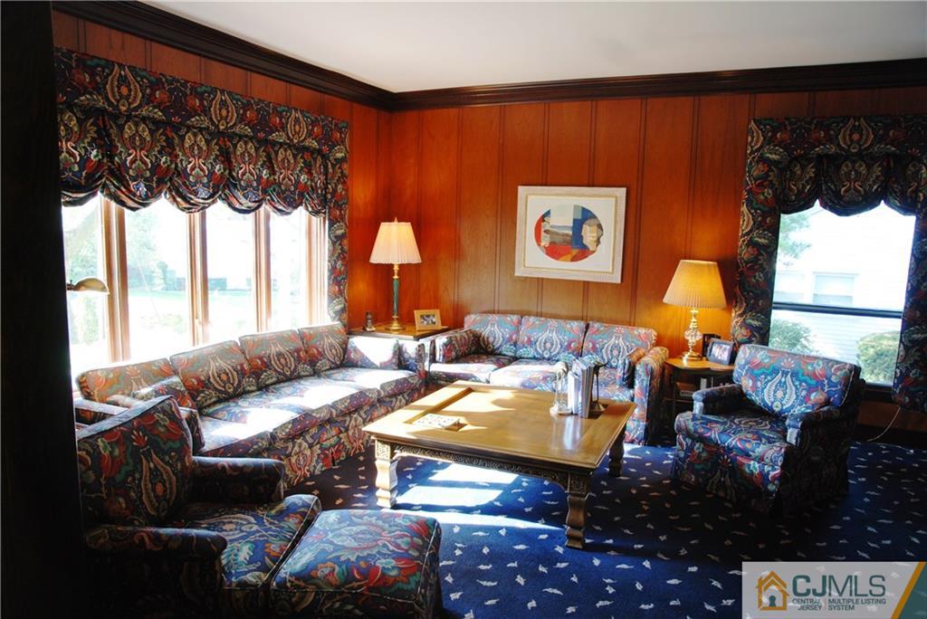 5 Moraine Road Edison, NJ 08820 - Photo 8 of 25 a living room with furniture and a window