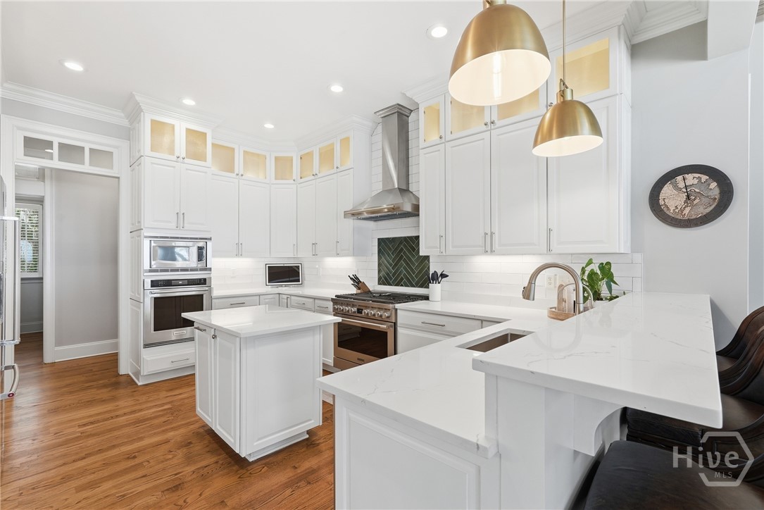 2024 Walthour Road Savannah, GA 31410 - Photo 10 of 46 Gas Chefs range, breakfast bar, island