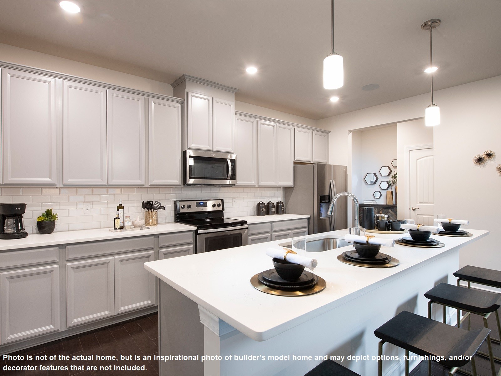 2088 Notchleaf Road Antioch, TN 37013 - Photo 5 of 12 a kitchen with a sink a stove and chairs