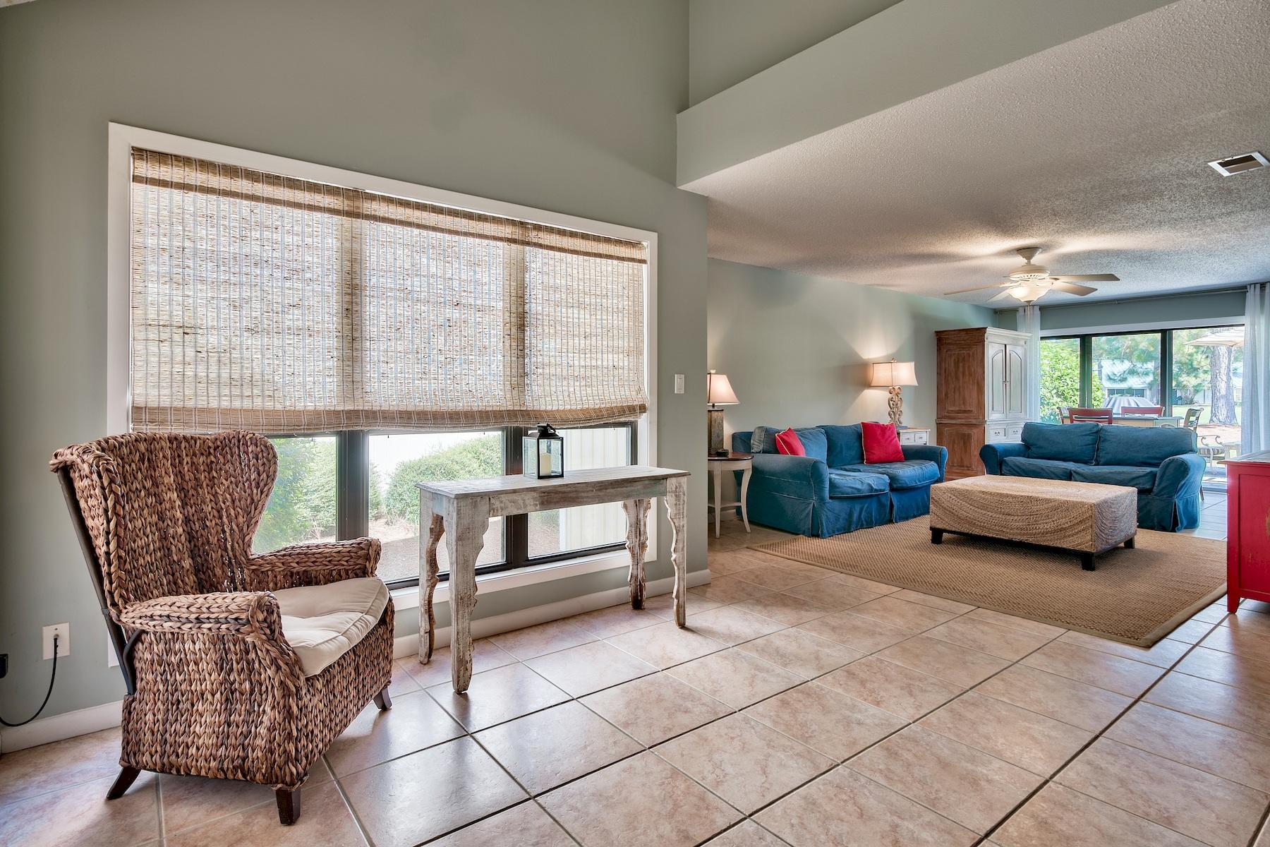 716 Sandpiper Drive, Unit 10508 Miramar Beach, FL 32550 - Photo 20 of 22 a living room with furniture and a large window