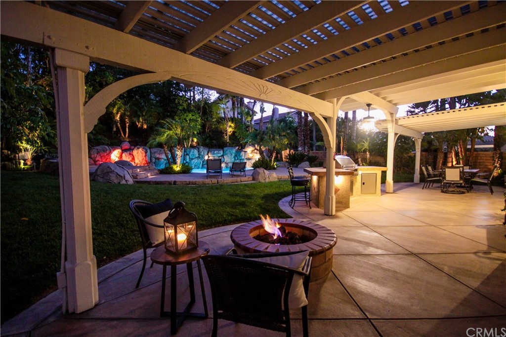 1836 Willow Bluff Drive Corona, CA 92883 - Photo 59 of 64 a view of a chairs and tables in a patio