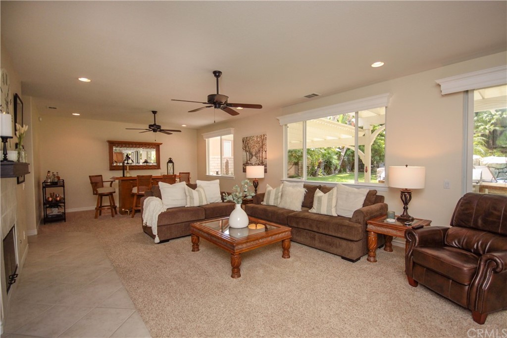 1836 Willow Bluff Drive Corona, CA 92883 - Photo 7 of 64 a living room with furniture and a large window