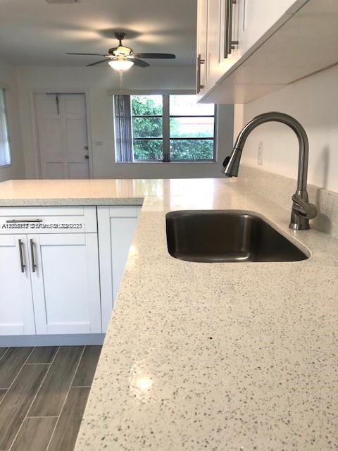 215 Southwest 10th Street Hallandale Beach, FL 33009 - Photo 4 of 14 a close view of sink and tap