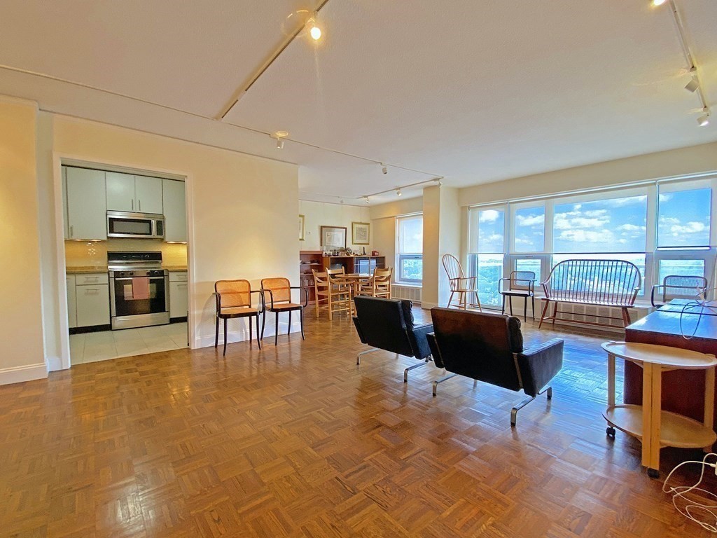 a living room with furniture and a table