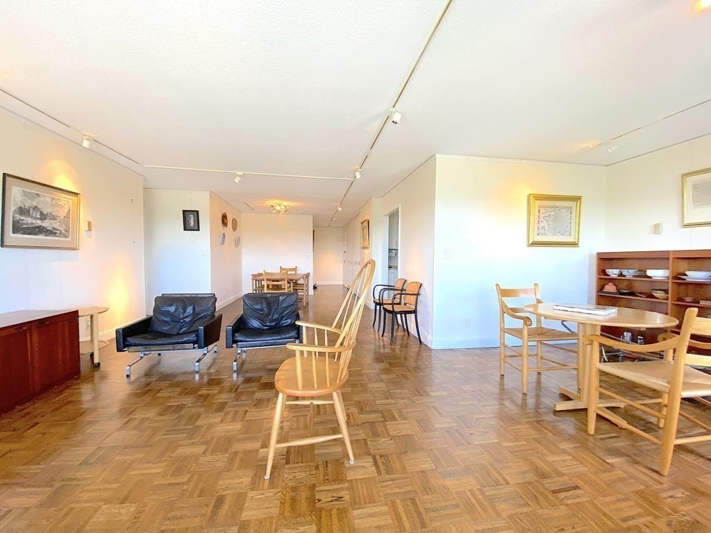 111 Perkins Street, Unit 186 Boston, MA 02130 - Photo 11 of 34 a view of a dining hall with furniture