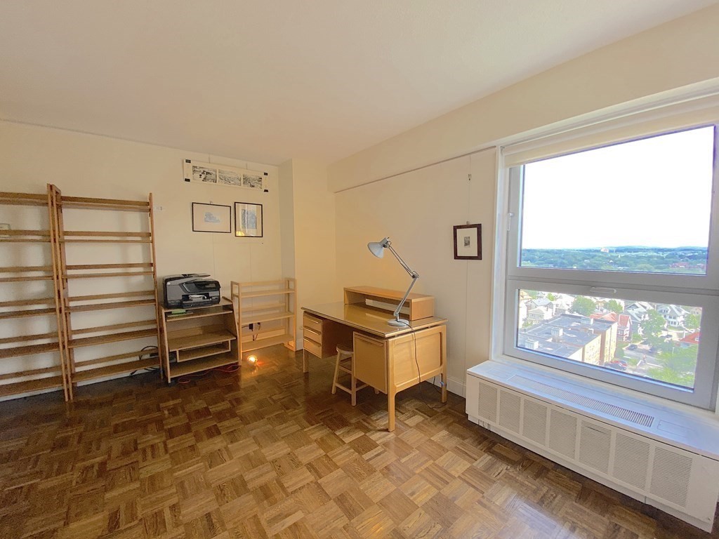 111 Perkins Street, Unit 186 Boston, MA 02130 - Photo 22 of 34 a living room with furniture and a window