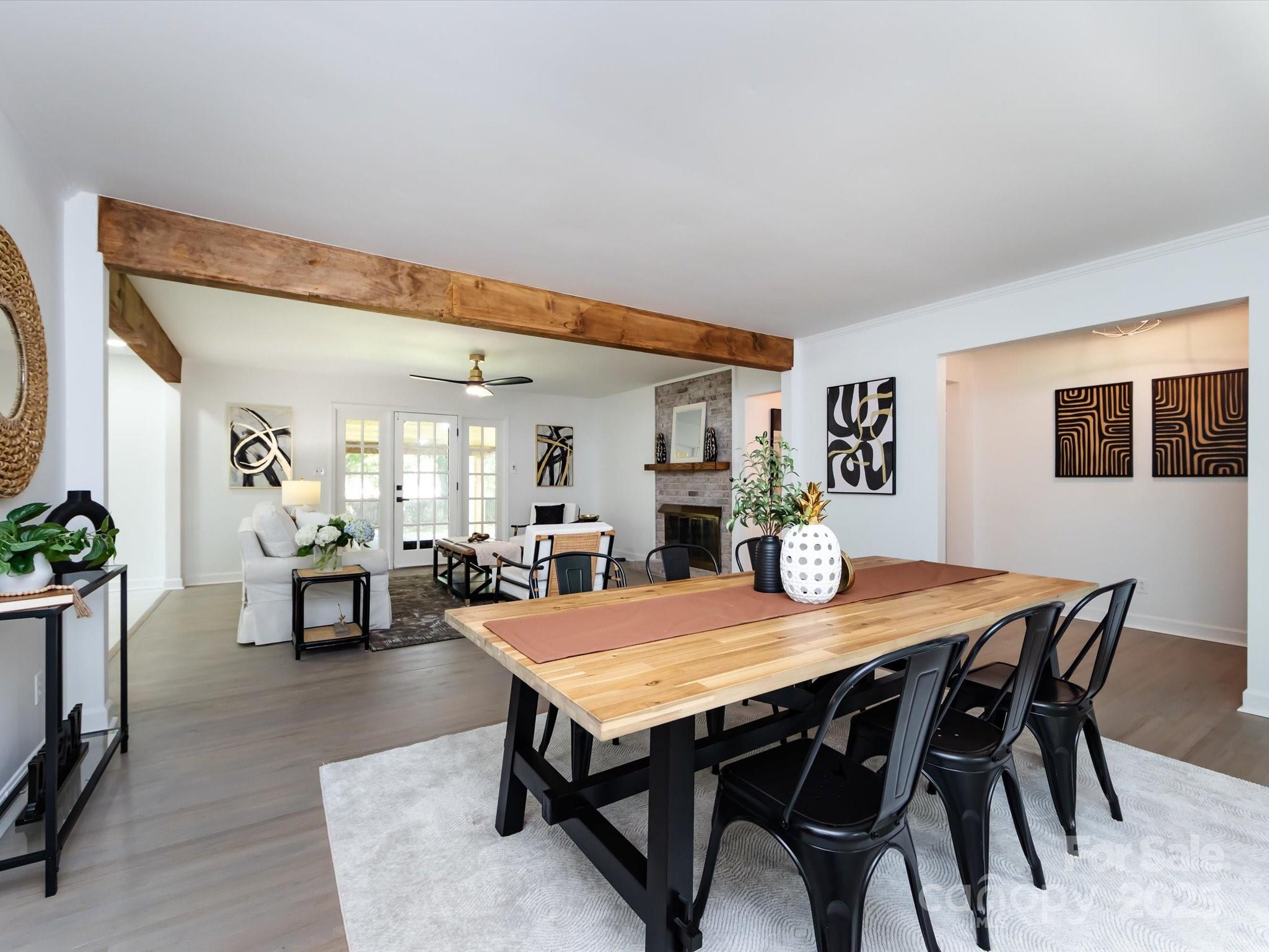 6017 Brace Road Charlotte, NC 28211 - Photo 11 of 47 a view of a dining room with furniture