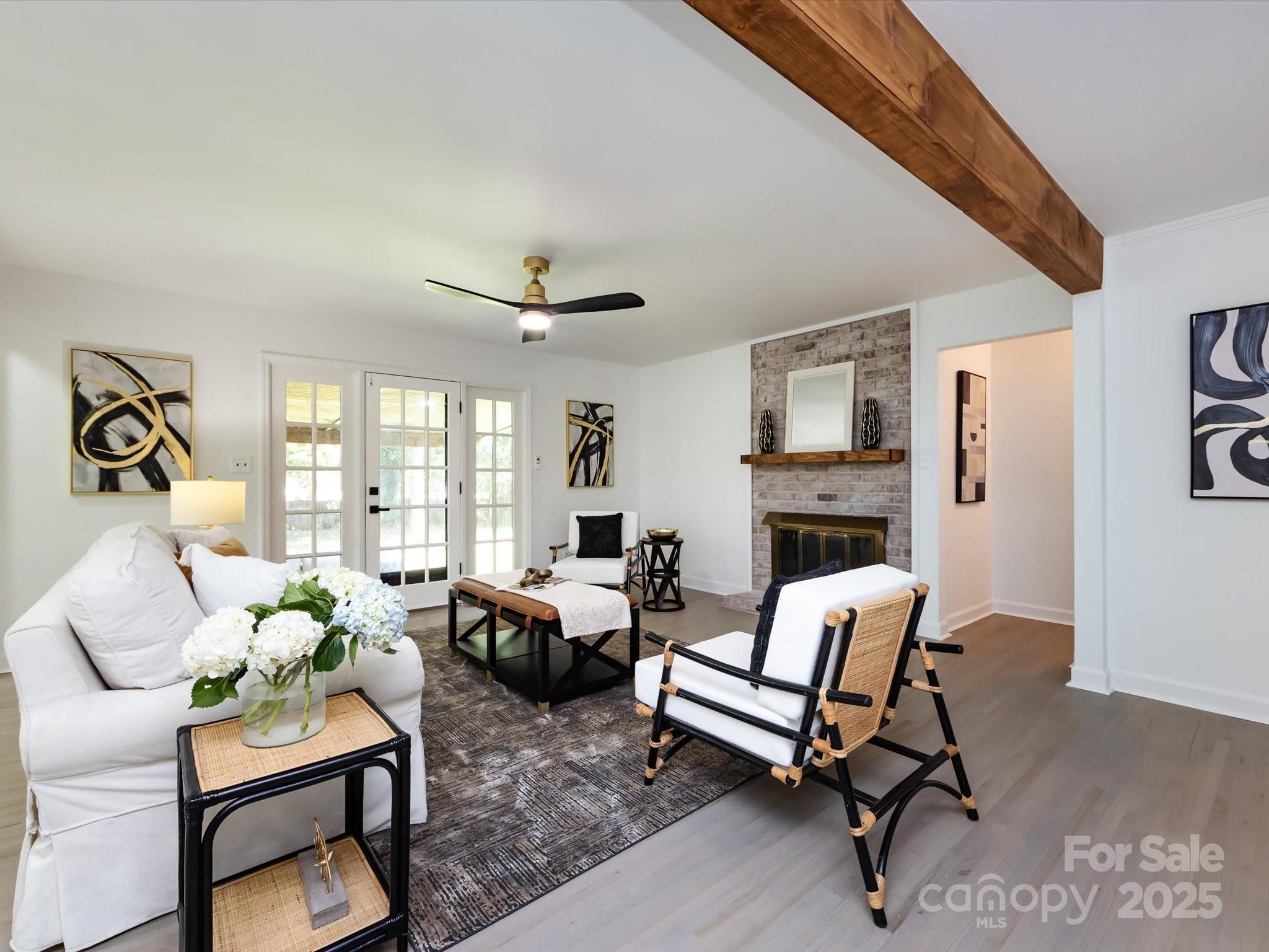 6017 Brace Road Charlotte, NC 28211 - Photo 14 of 47 a living room with furniture and a fireplace