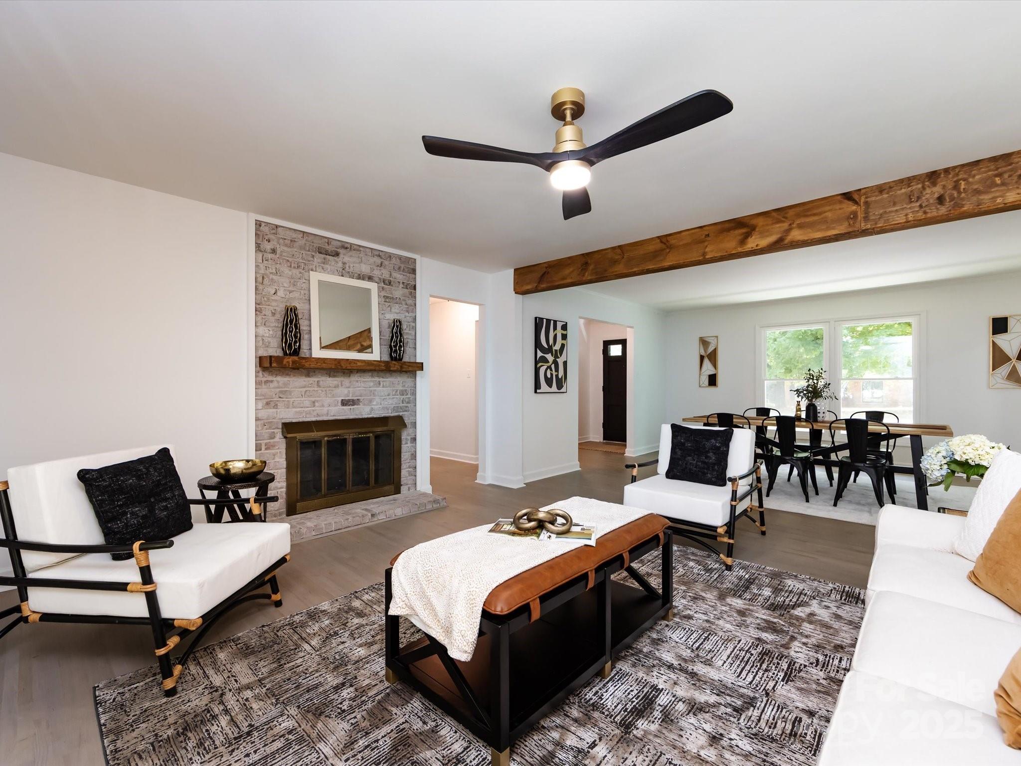 6017 Brace Road Charlotte, NC 28211 - Photo 15 of 47 a living room with furniture and a fireplace