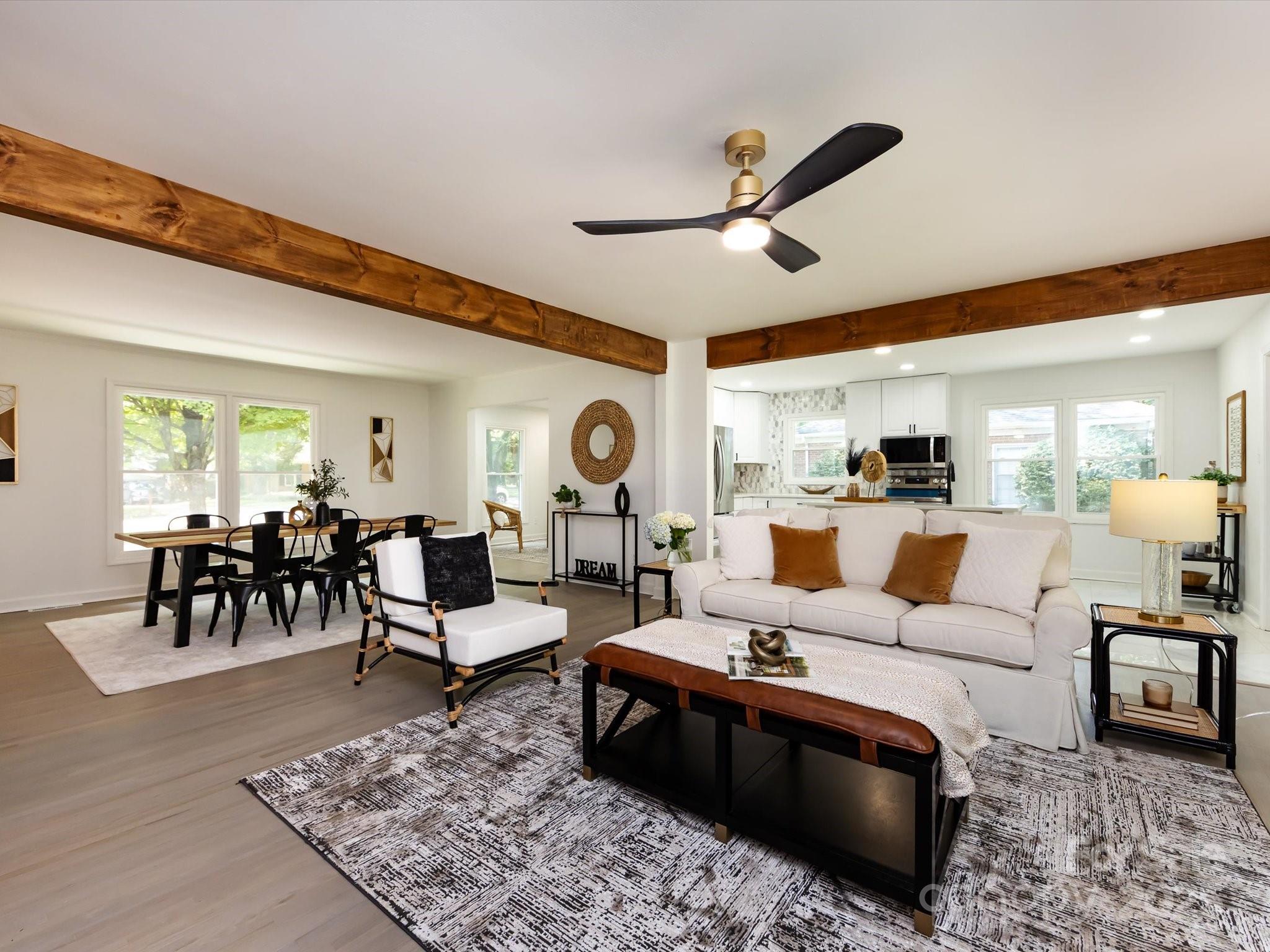 6017 Brace Road Charlotte, NC 28211 - Photo 16 of 47 a living room with furniture and a large window