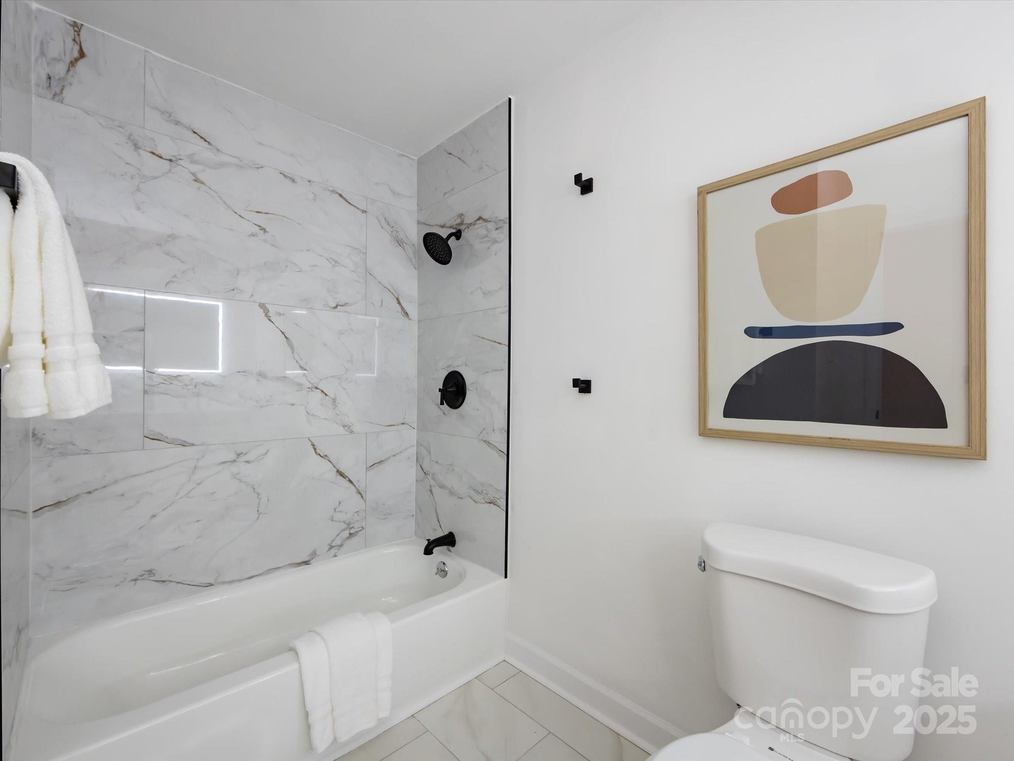 6017 Brace Road Charlotte, NC 28211 - Photo 36 of 47 a bathroom with a toilet and a shower