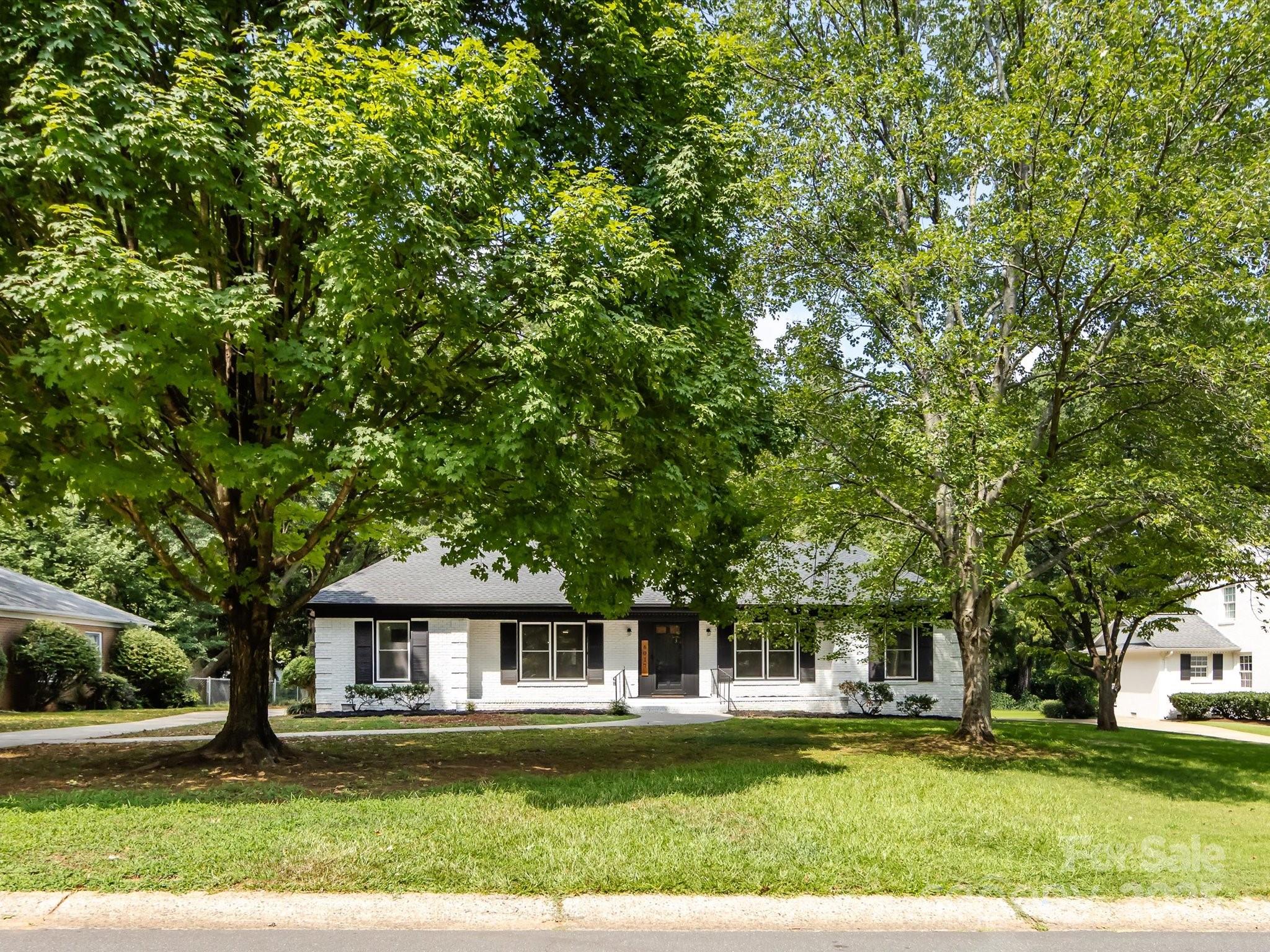 6017 Brace Road Charlotte, NC 28211 - Photo 4 of 47 front view of a house with a yard