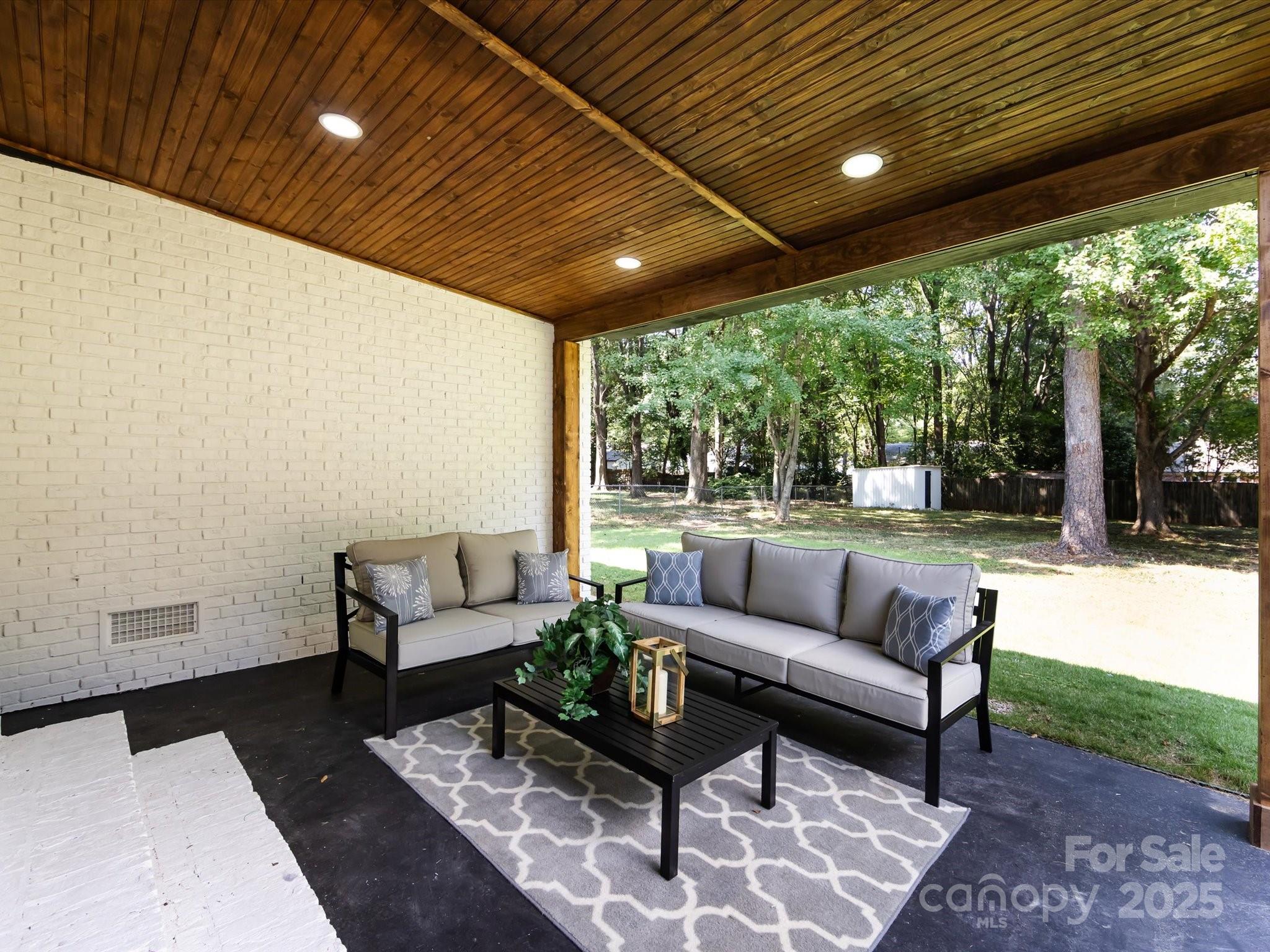6017 Brace Road Charlotte, NC 28211 - Photo 46 of 47 a living room with furniture and a large window