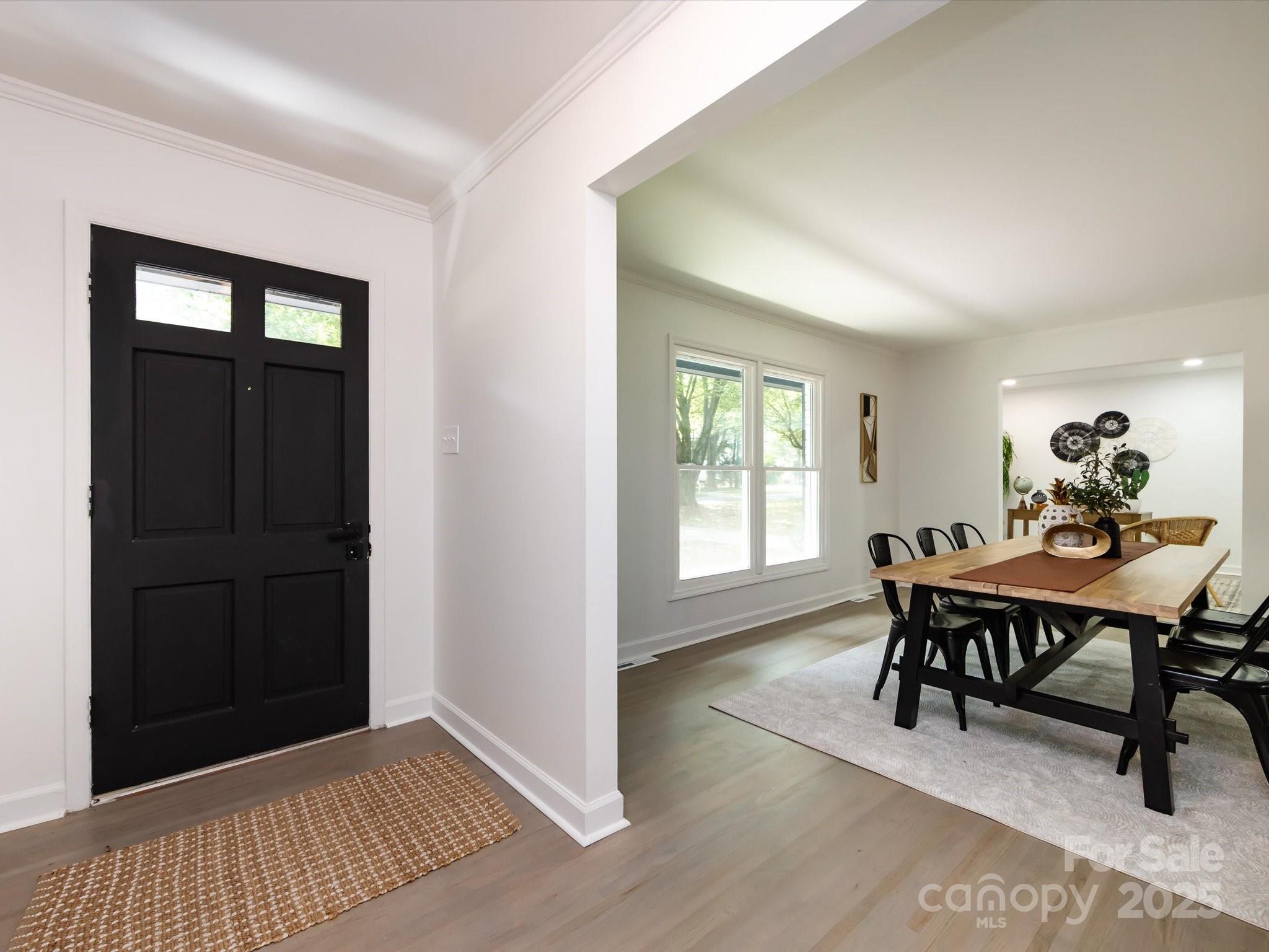 6017 Brace Road Charlotte, NC 28211 - Photo 6 of 47 a view of a dining room with furniture and window