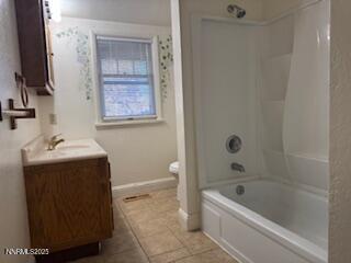 812 Lander Street, Unit A Reno, NV 89509 - Photo 10 of 24 a bathroom with a bathtub sink and toilet
