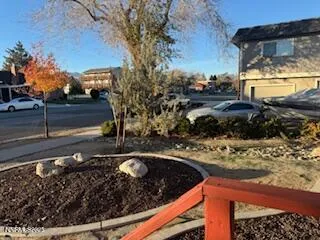 a view of a back yard of the house
