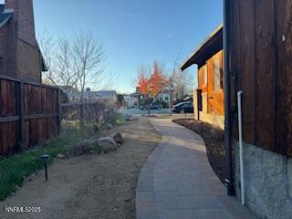 812 Lander Street, Unit A Reno, NV 89509 - Photo 22 of 24 a pathway between two buildings