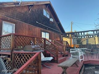 812 Lander Street, Unit A Reno, NV 89509 - Photo 23 of 24 a view of roof deck with wooden floor and seating space