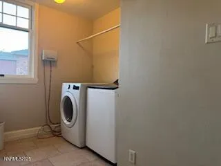 a kitchen with granite countertop a sink stove and refrigerator