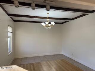 812 Lander Street, Unit A Reno, NV 89509 - Photo 9 of 24 a view of a chandelier fan in a room