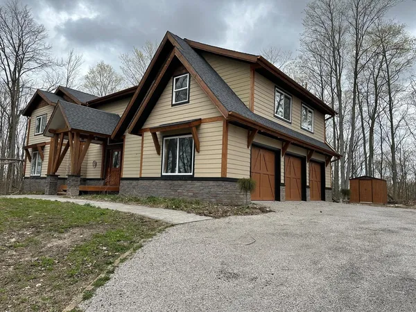 $700,000 | 7058 Shade Tree Lane, Traverse City, MI 49685