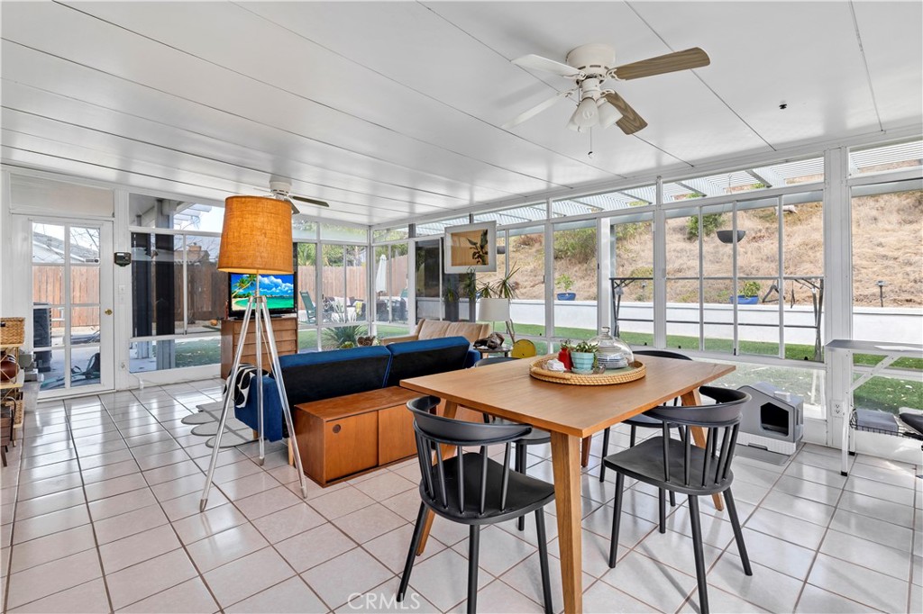 44882 Tehachapi Pass Temecula, CA 92592 - Photo 13 of 34 a view of a dining room with furniture window and outside view