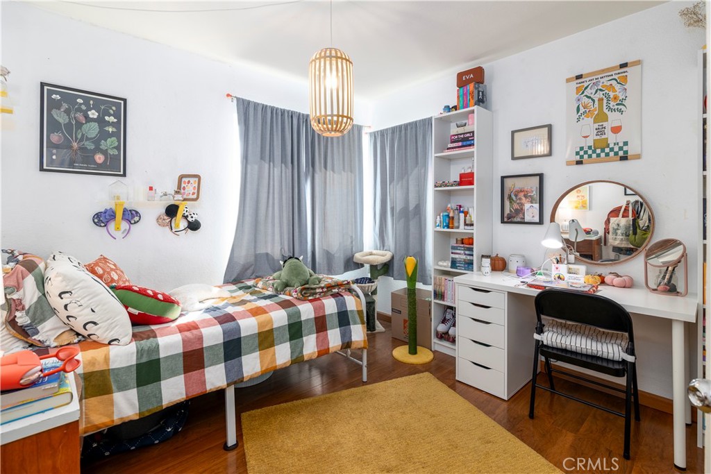 44882 Tehachapi Pass Temecula, CA 92592 - Photo 19 of 34 a bedroom with furniture and a bed