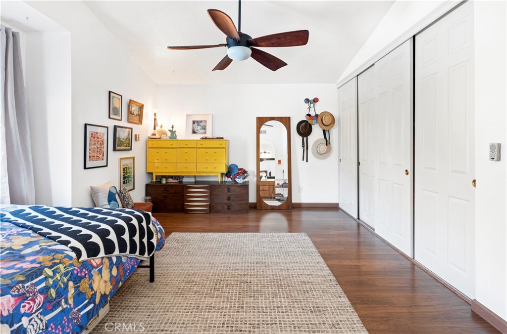 44882 Tehachapi Pass Temecula, CA 92592 - Photo 22 of 34 a bedroom with bed and wooden floor