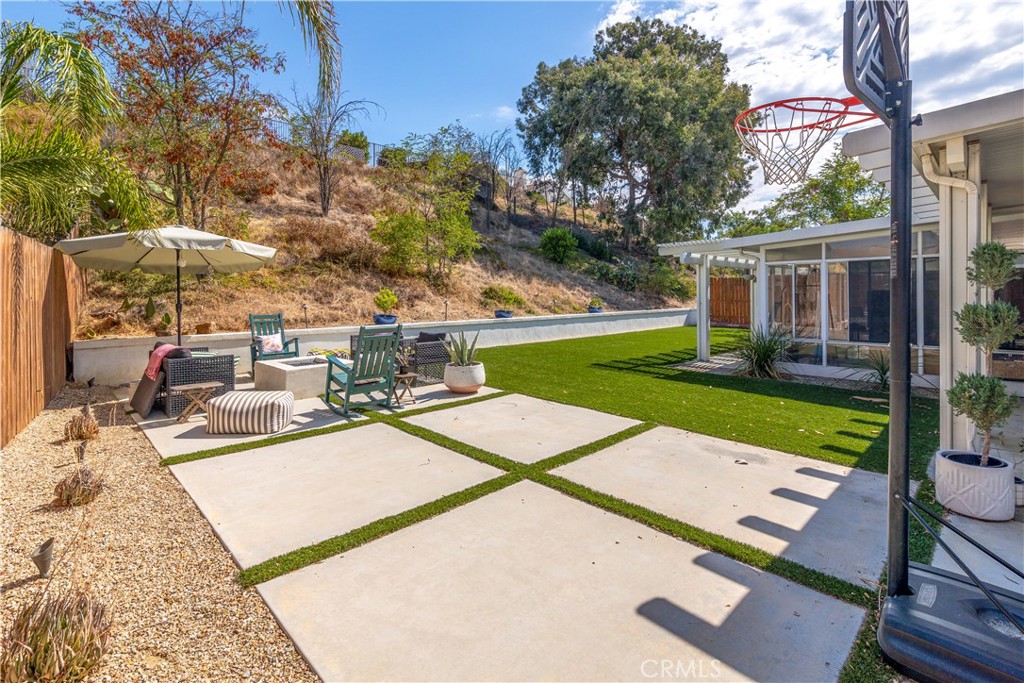44882 Tehachapi Pass Temecula, CA 92592 - Photo 26 of 34 a view of a backyard with sitting area