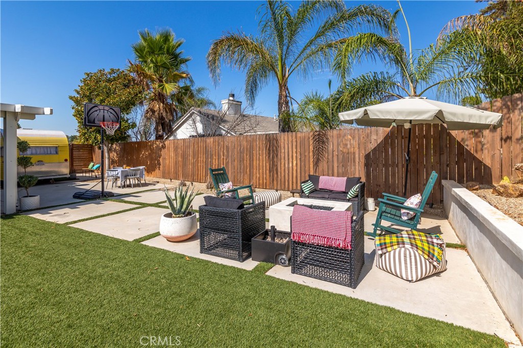 44882 Tehachapi Pass Temecula, CA 92592 - Photo 27 of 34 a view of an outdoor sitting area with chairs