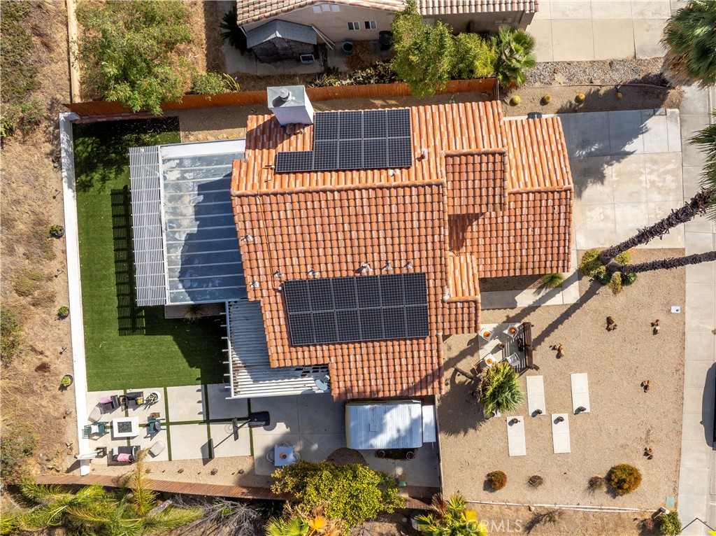 44882 Tehachapi Pass Temecula, CA 92592 - Photo 30 of 34 a front view of a house with a garden