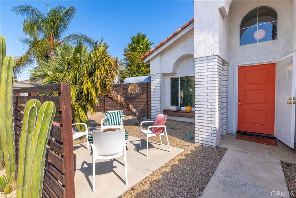 44882 Tehachapi Pass Temecula, CA 92592 - Photo 3 of 34 a building outdoor space with patio furniture