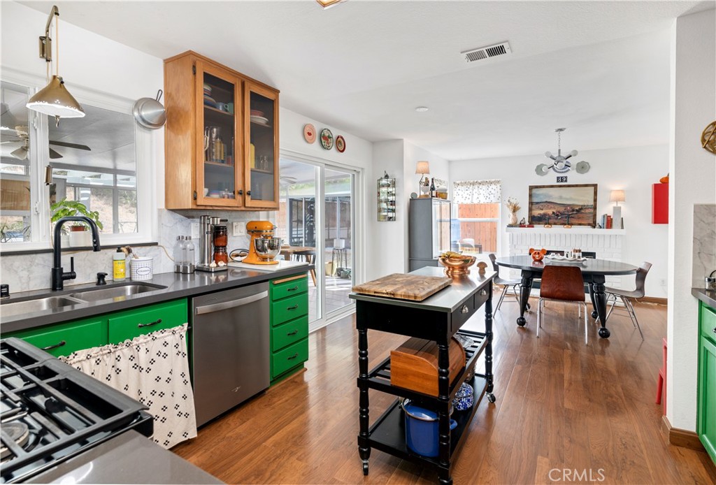 44882 Tehachapi Pass Temecula, CA 92592 - Photo 9 of 34 a living room with furniture and a wooden floor