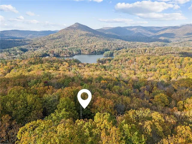 a view of a lake with mountains in the background