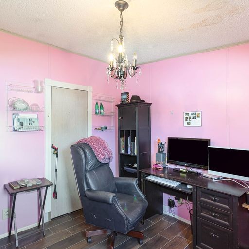 107 New Deal Potts Road Cottontown, TN 37048 - Photo 18 of 31 a workspace with furniture and wooden floor